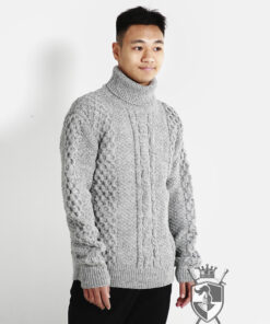 Turtleneck hand-knitted wool sweater with ball pattern