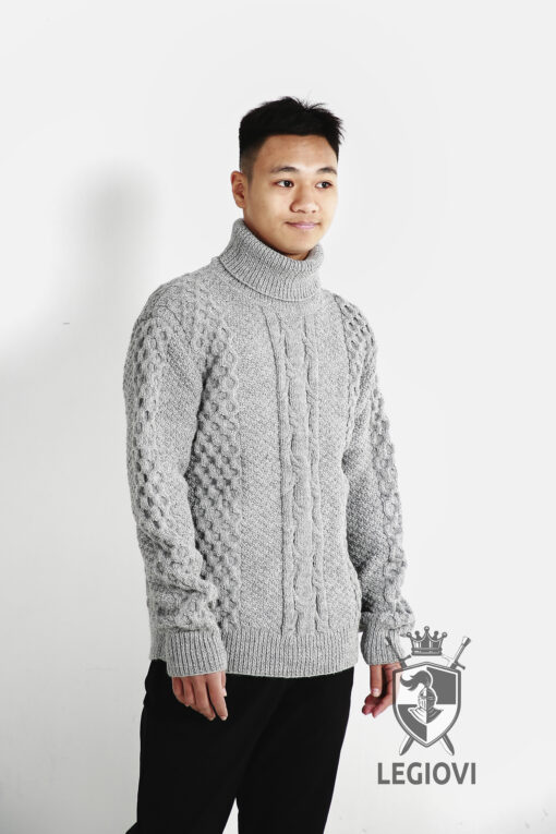 Turtleneck hand-knitted wool sweater with ball pattern