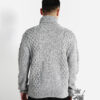 Turtleneck hand-knitted wool sweater with ball pattern