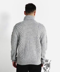 Turtleneck hand-knitted wool sweater with ball pattern